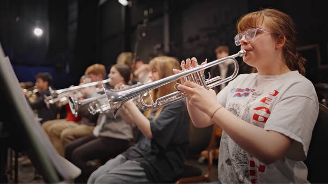 Youth orchestra expertly trolls car company who made fun of young musicians in TV advert